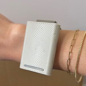 Embr Wave 1, visibly worn but works great! Will include charger.